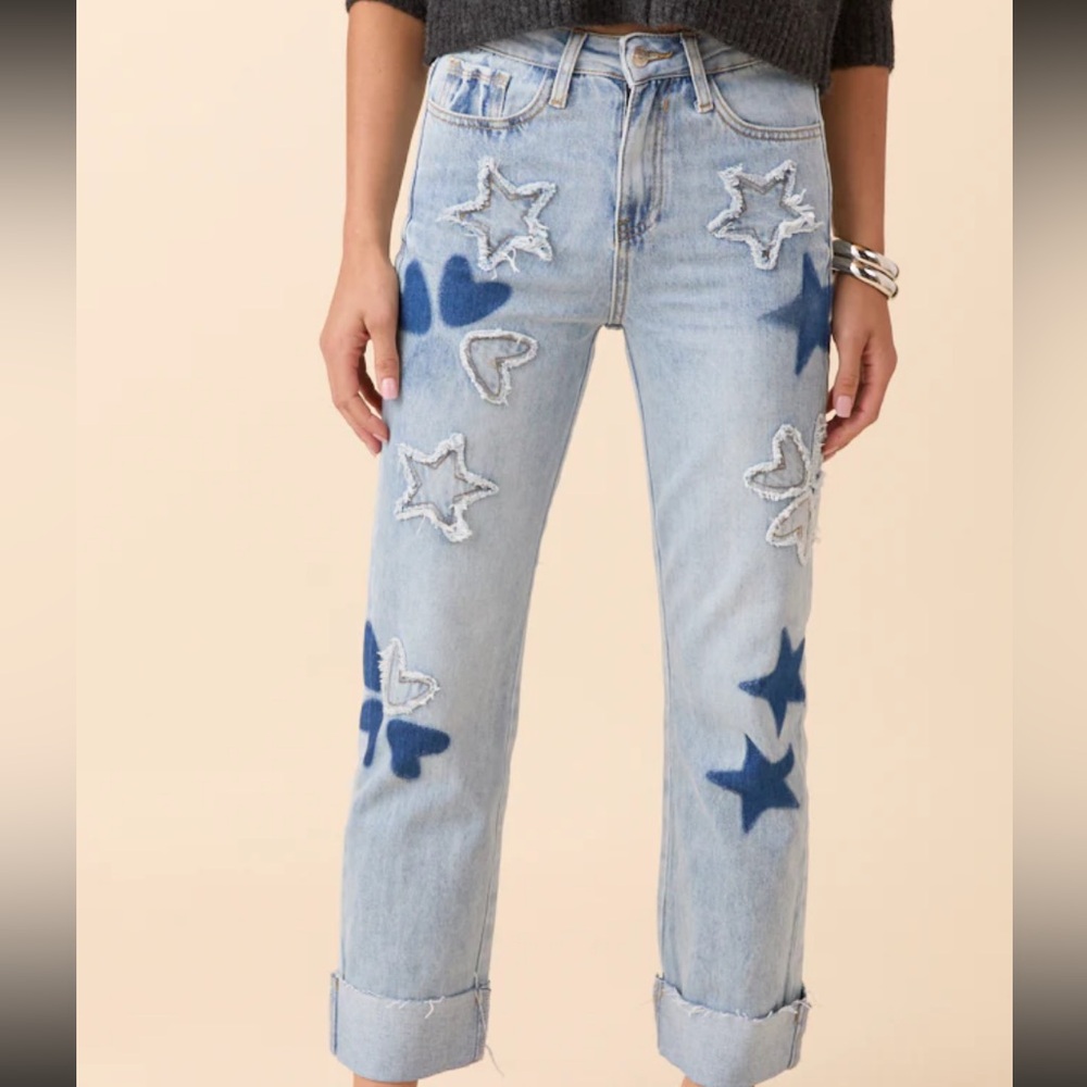 Embroidered jeans with hearts and stars